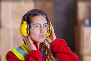 Woman wearing ear protection headphones