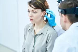 Woman being checked for hearing loss