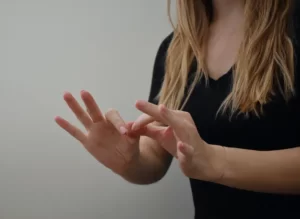 Pairing Sign Language with Hearing Aids