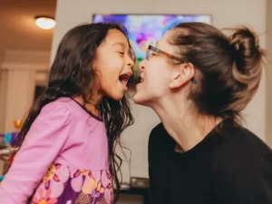 Mother and daughter singing together